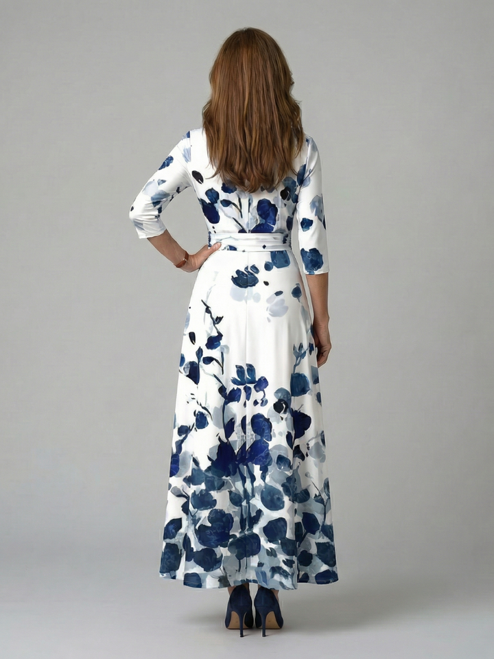 Celeste™ | Midi Floral Φόρεμα με Σταυρωτό Ντεκολτέ και Τρία Πέμπτα Μανίκια